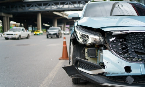 A photo of the front part of the vehicle showing its damaged after a crash